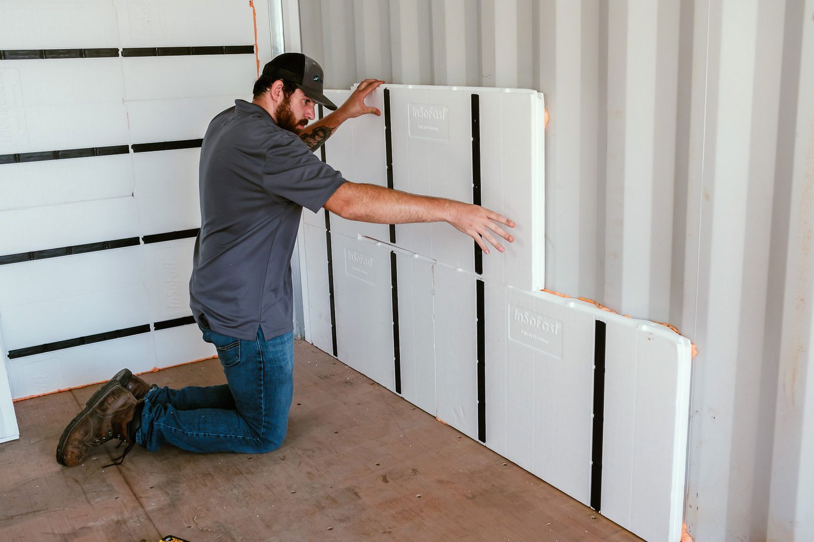 installing insofast insulation panels in shipping container